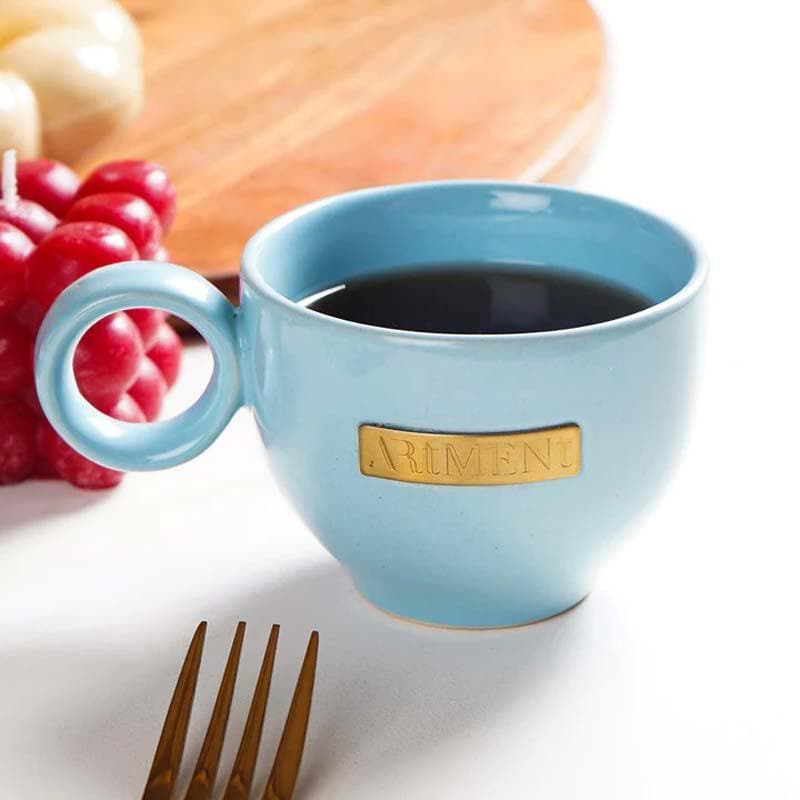 Buy Bubbly Bloom Cup And Saucer - Baby Blue Tea Cup & Saucer from Vaaree