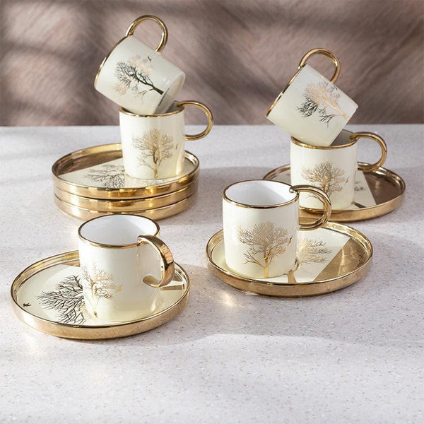 Buy Tea Cup & Saucer - Emiko Cup & Saucer (Beige) - Twelve Piece Set at Vaaree online