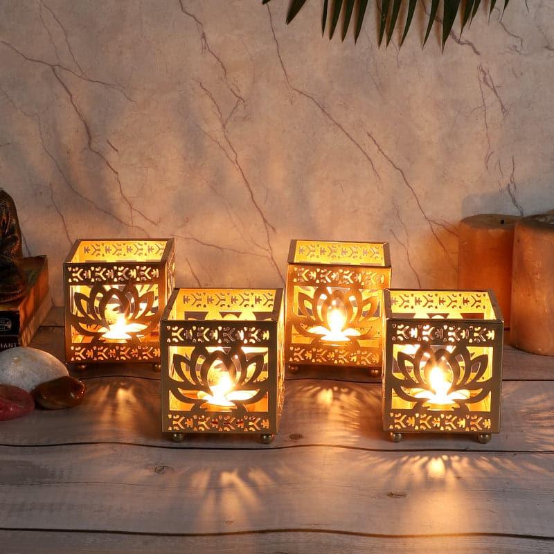 Buy Tea Light Candle Holders - Ambuja Ethched Tealight Candle Holder - Set Of Four at Vaaree online