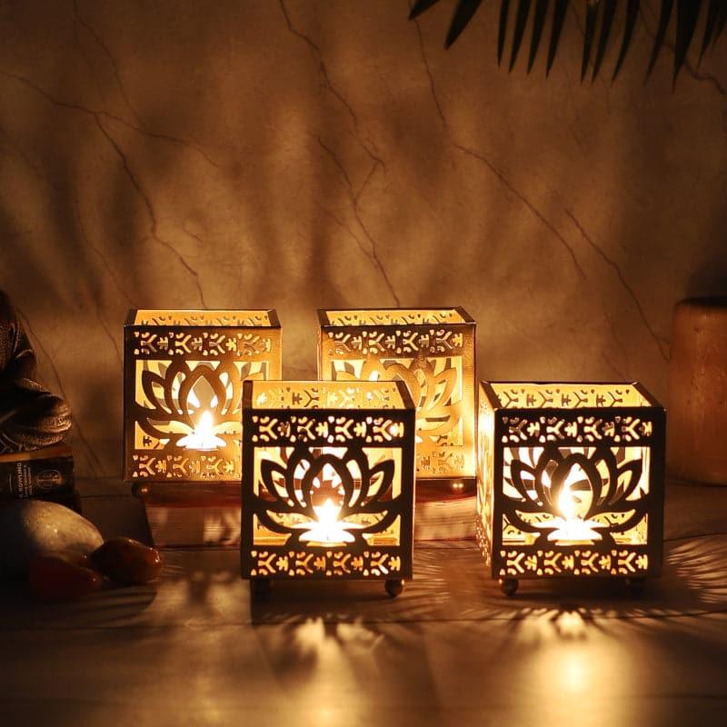 Buy Tea Light Candle Holders - Ambuja Ethched Tealight Candle Holder - Set Of Four at Vaaree online