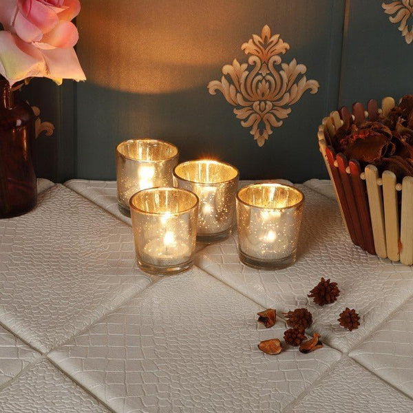 Buy Brionne Tealight Candle Holder (Silver) - Set Of Four Candle Holders from Vaaree