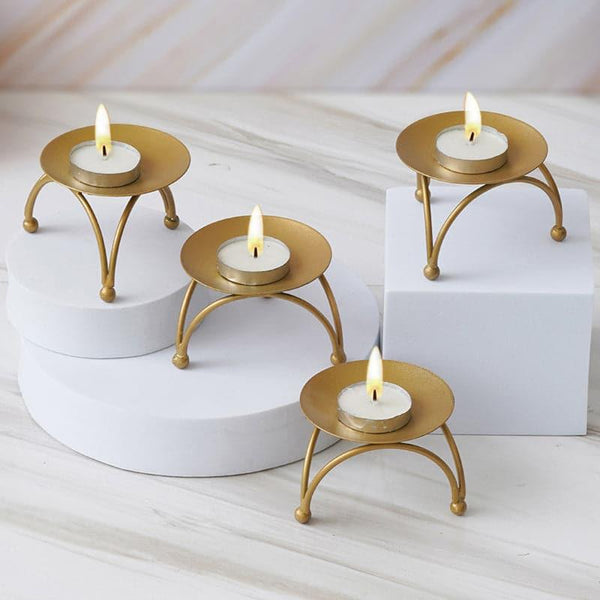 Buy Daksa Tealight Holder - Set Of Four Candle Holders from Vaaree