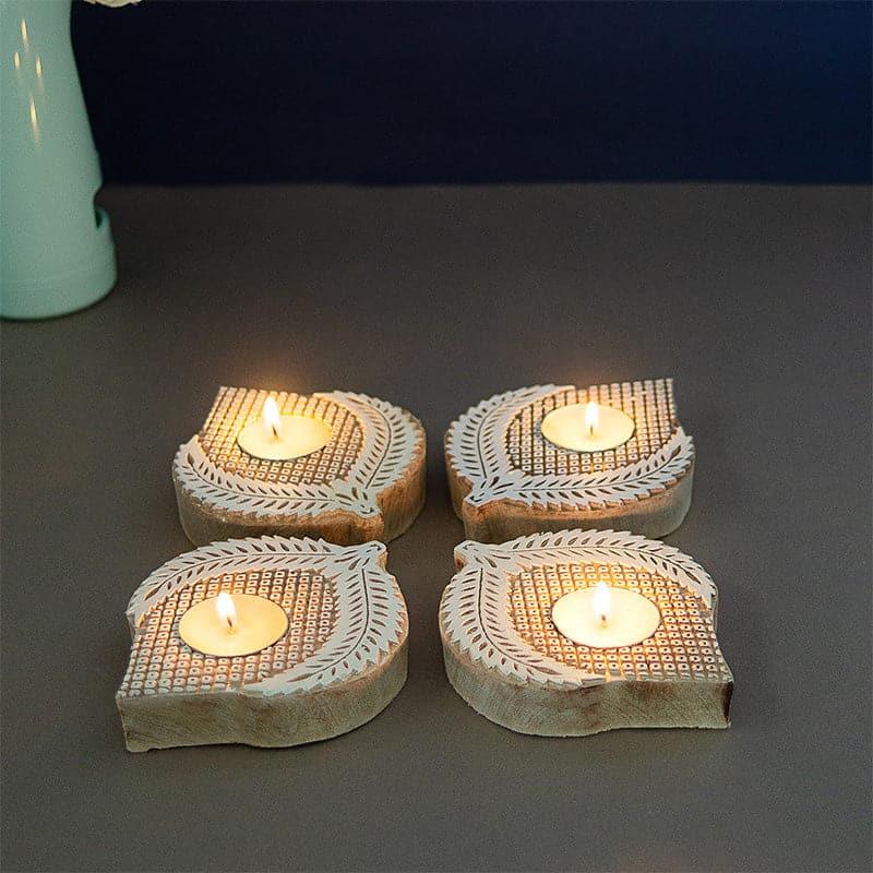 Buy Dorda Tealight Candle Holder - Set Of Four Candle Holders from Vaaree