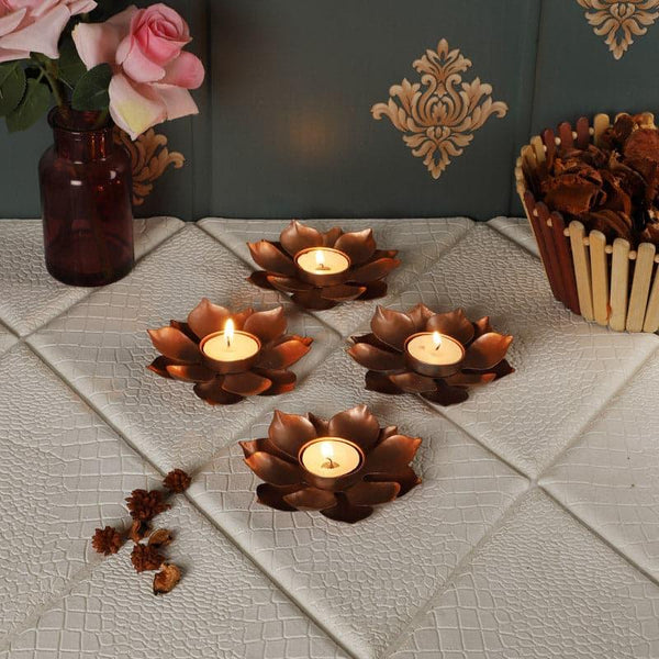 Buy Ethnic Flower Tealight Holder - Set Of Four Candle Holders from Vaaree