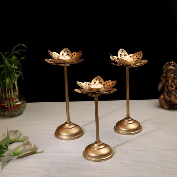 Buy Flora Flow Tealight Candle Holder - Set Of Three Candle Holders from Vaaree