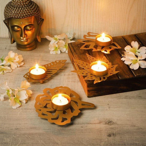 Buy Flora Sacred Tealight Candle Holder - Set Of Four Candle Holders from Vaaree