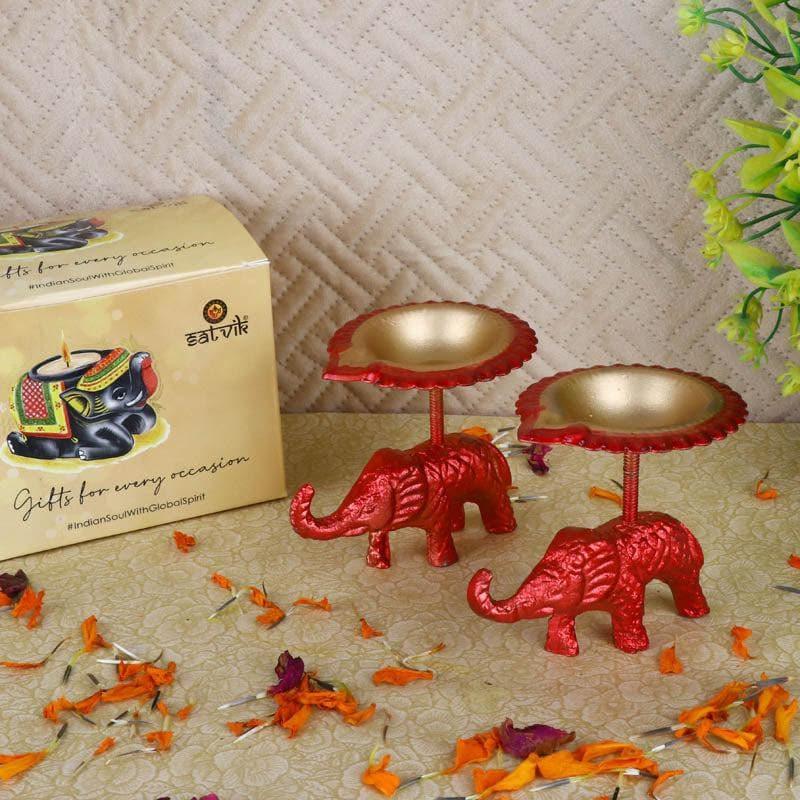 Buy Gajmukut Tealight Candle (Red) - Set Of Two Candle Holders from Vaaree