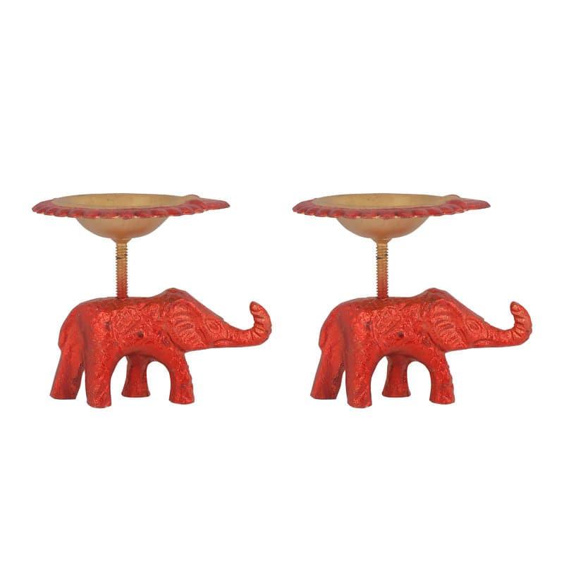 Buy Gajmukut Tealight Candle (Red) - Set Of Two Candle Holders from Vaaree