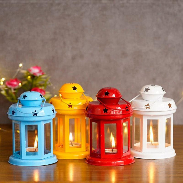 Buy Tea Light Candle Holders - Lantern Lore Tealight Candle Holder - Set Of Four at Vaaree online