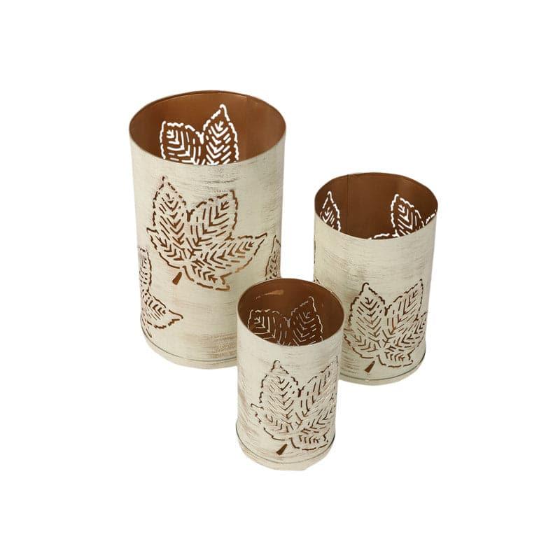 Buy Maple Mela Tealight Candle Holder - Set Of Three Candle Holders from Vaaree