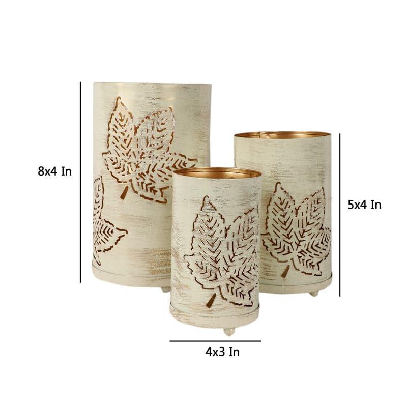 Buy Maple Mela Tealight Candle Holder - Set Of Three Candle Holders from Vaaree