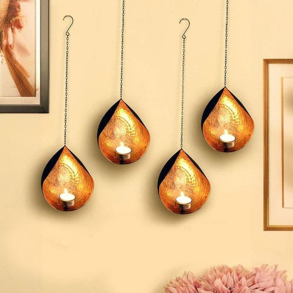 Buy Nivo Hanging Candle Holder - Set Of Four Candle Holders from Vaaree