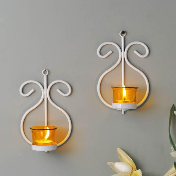 Buy Seina White Frame Sconce Candle Holder (Yellow) - Set Of Two Candle Holders from Vaaree