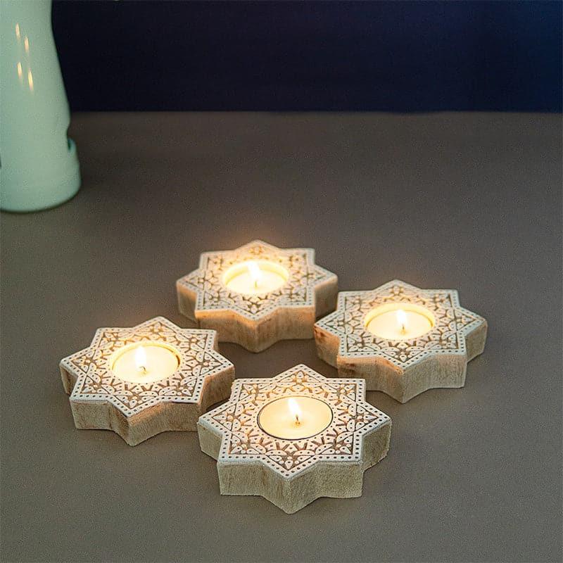 Buy Star Magic Tealight Candle Holder - Set Of Four Candle Holders from Vaaree