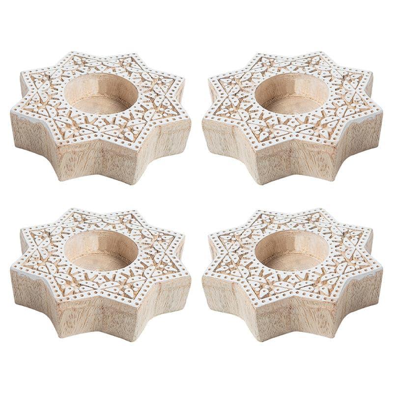 Buy Star Magic Tealight Candle Holder - Set Of Four Candle Holders from Vaaree