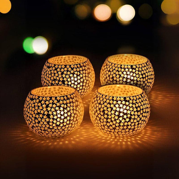 Buy Starry Muse Tealight Candle Holder - Set Of Four Candle Holders from Vaaree