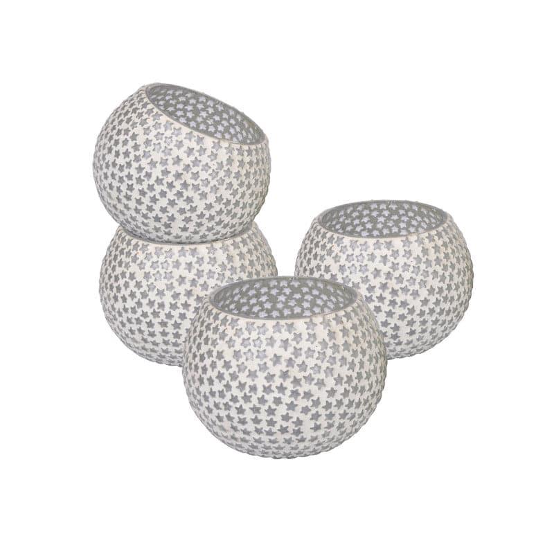 Buy Starry Muse Tealight Candle Holder - Set Of Four Candle Holders from Vaaree