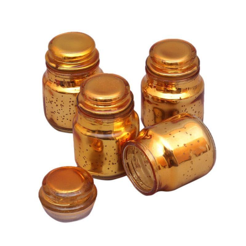 Buy Tarusha Tealight Candle Holder (Gold) - Set Of Four Candle Holders from Vaaree