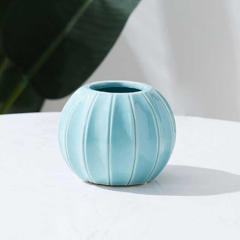 Buy Artsy Globe Vase - Blue Vase from Vaaree