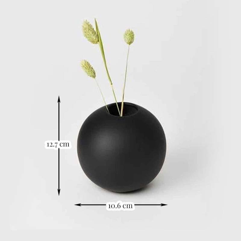 Buy Caim Vase - Black Vase from Vaaree