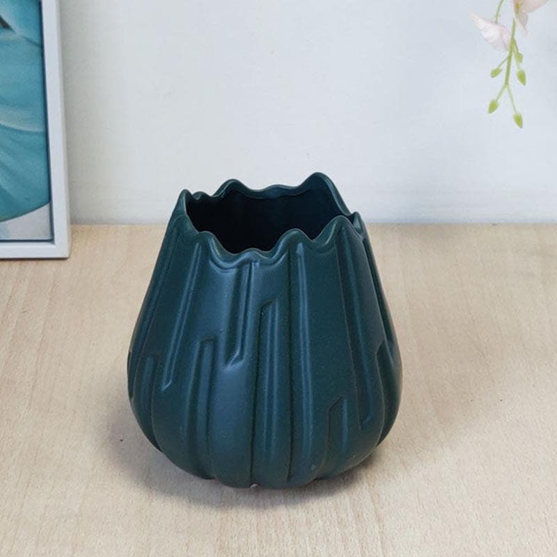 Buy Quirky Pottery Vase - Green Vase from Vaaree