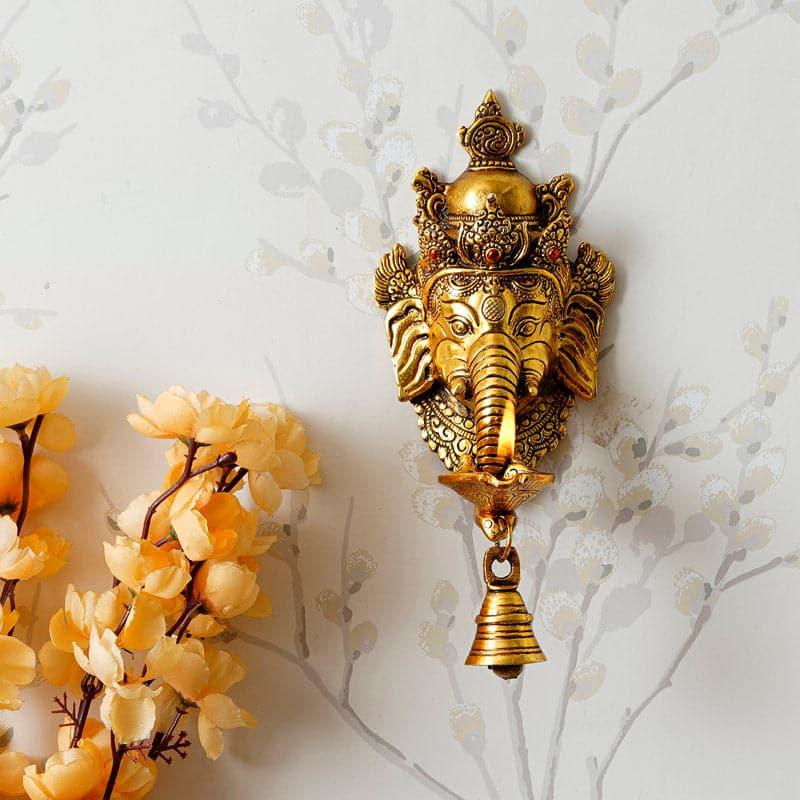 Buy Ganesh Diya With Bell Wall Accents from Vaaree