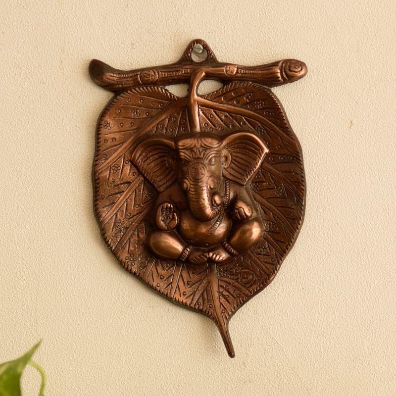 Buy Lord Ganesha On Leaf Wall Accent Wall Accents from Vaaree