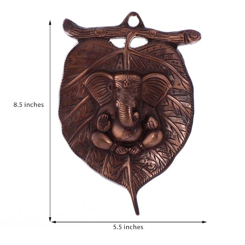 Buy Lord Ganesha On Leaf Wall Accent Wall Accents from Vaaree