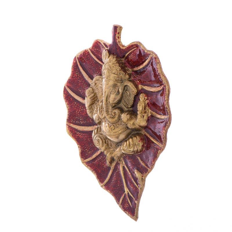 Buy Lord Ganesha On Red Leaf Idol Wall Accent Wall Accents from Vaaree