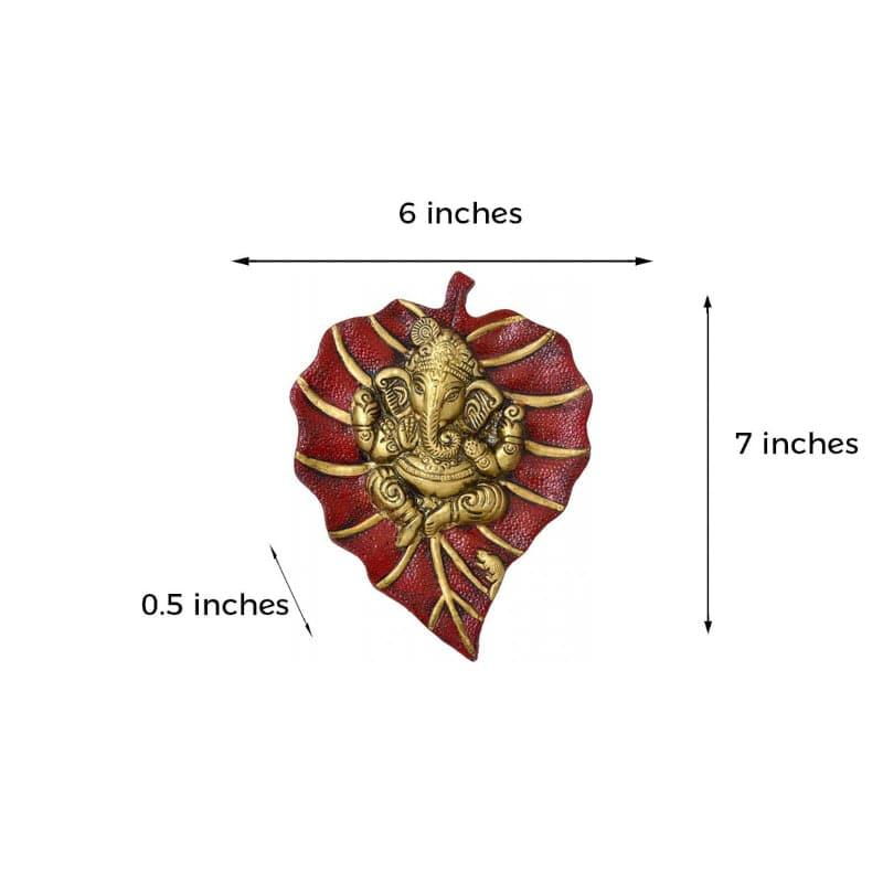 Buy Lord Ganesha On Red Leaf Idol Wall Accent Wall Accents from Vaaree