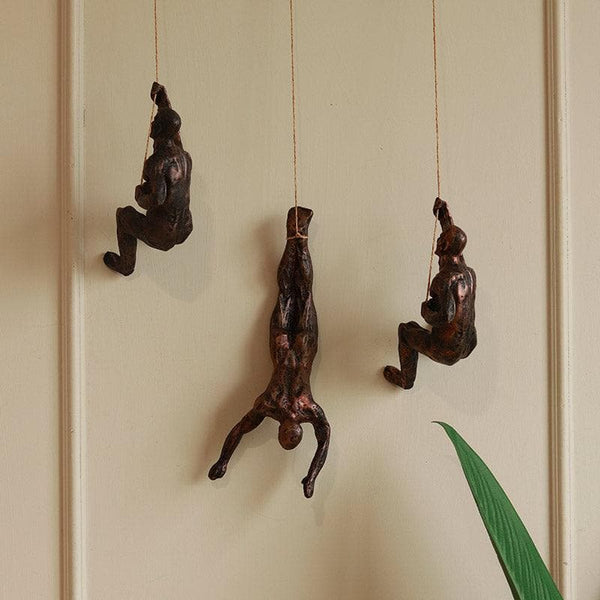Buy Wall Accents - The Alpinist Showpiece (Bronze) - Set Of Three at Vaaree online