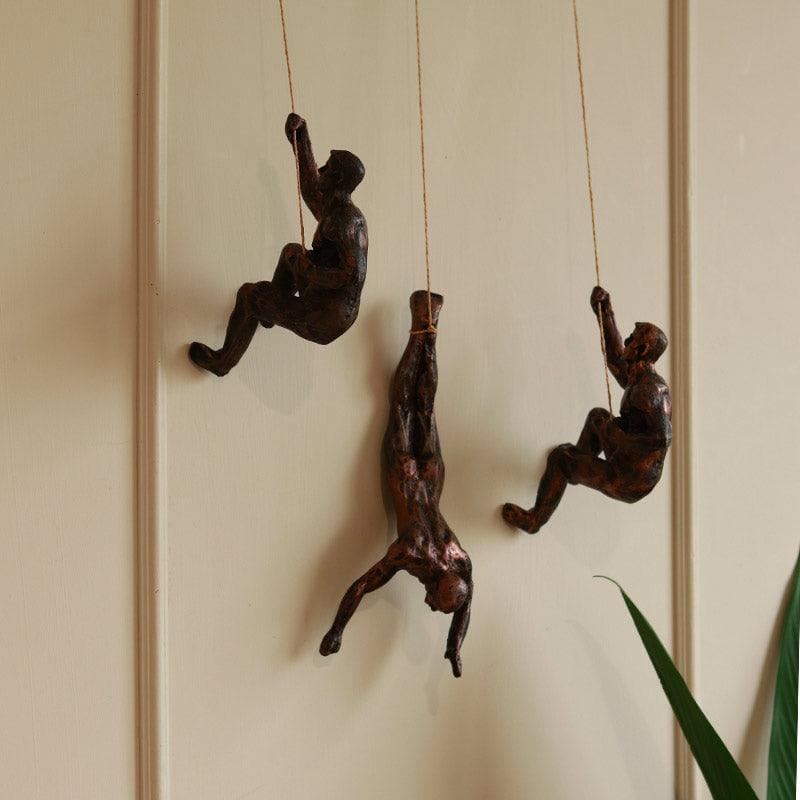 Buy The Alpinist Showpiece (Bronze) - Set Of Three Wall Accents from Vaaree