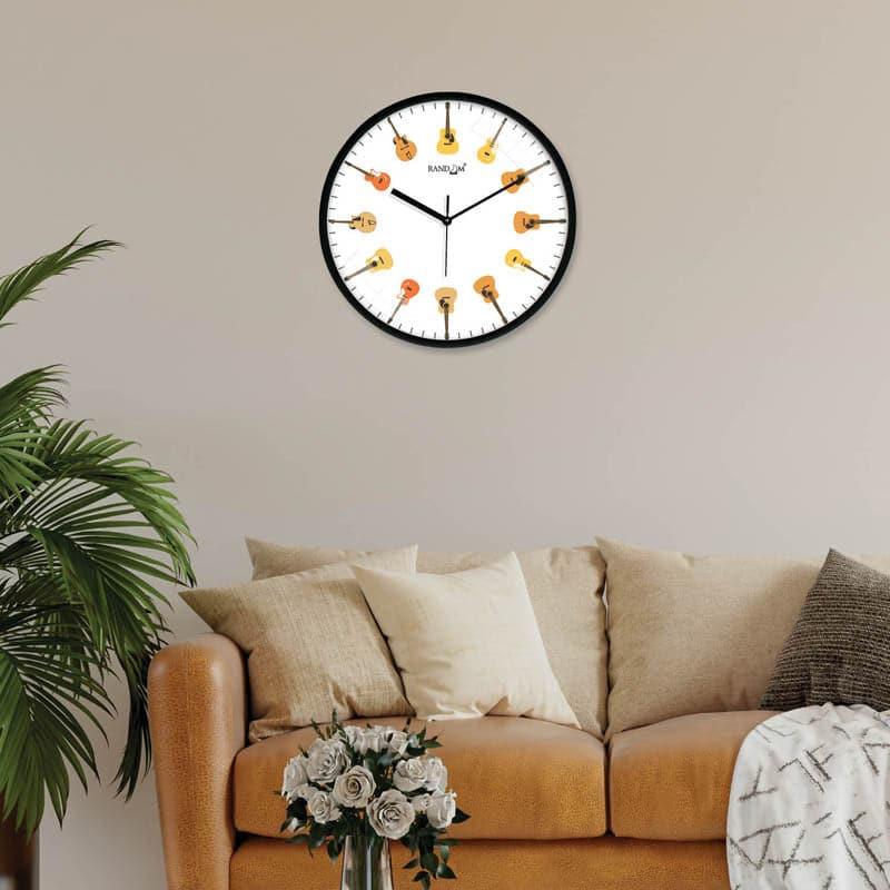 Buy Strung Symphony Wall Clock Wall Clock from Vaaree