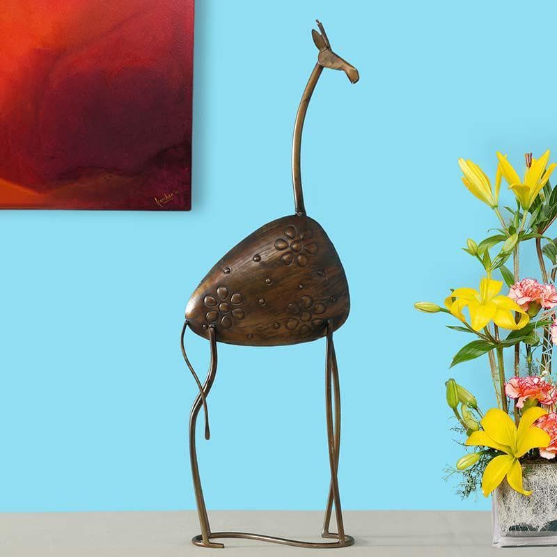 Buy Little Giraffe Statue at Vaaree online | Beautiful Showpieces to choose from