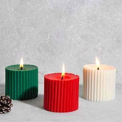 Buy Mini Christmas Trio Pillar Candle- Set Of Three at Vaaree online | Beautiful Candles to choose from