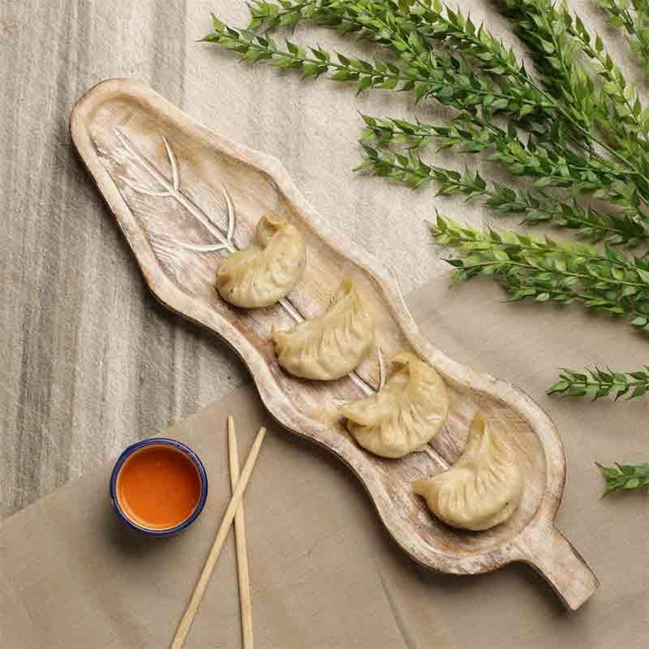 Buy Curvy Leaf Wooden Platter at Vaaree online | Beautiful Serving Platter to choose from