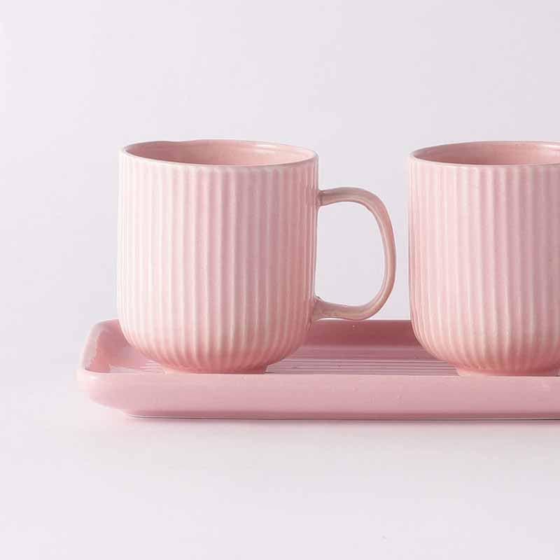 Buy Ribbed Raves Mug With Tray (Pink) - Set Of Two at Vaaree online | Beautiful Coffee & Tea Mug to choose from