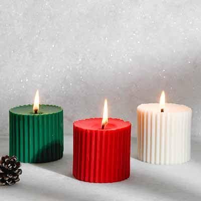 Buy Candles - Mini Christmas Trio Pillar Candle- Set Of Three at Vaaree online