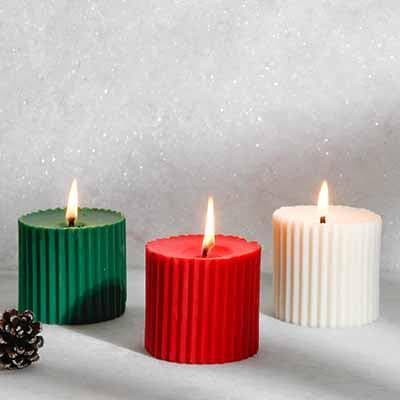 Buy Mini Christmas Trio Pillar Candle- Set Of Three Candles from Vaaree