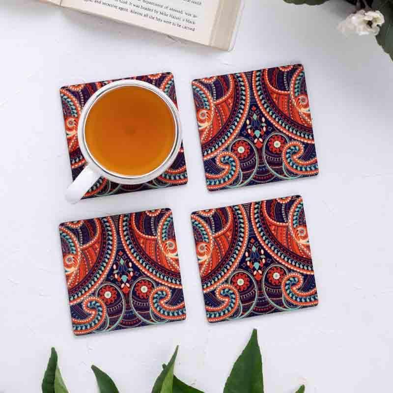 Buy Illuminating Paisley Wooden Square Coaster - Set Of Four Coasters from Vaaree