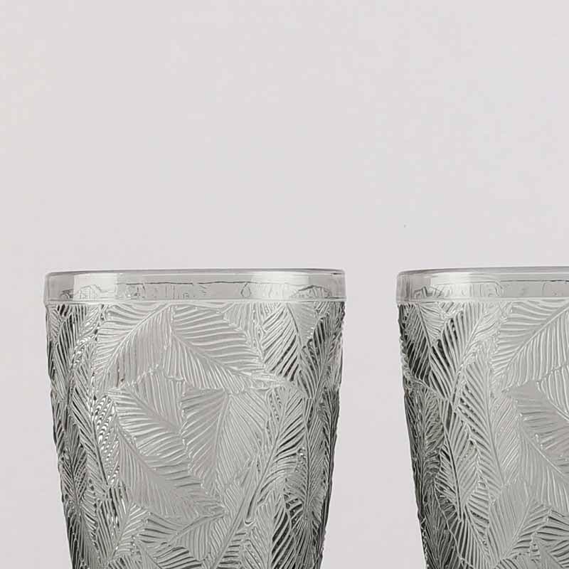 Buy Surreal Embossed Glass (300 ml ) - Set Of Four Drinking & Juice Glasses from Vaaree