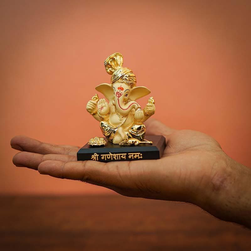 Buy Vakratunda Idol- Yellow/Gold Idols & Sets from Vaaree