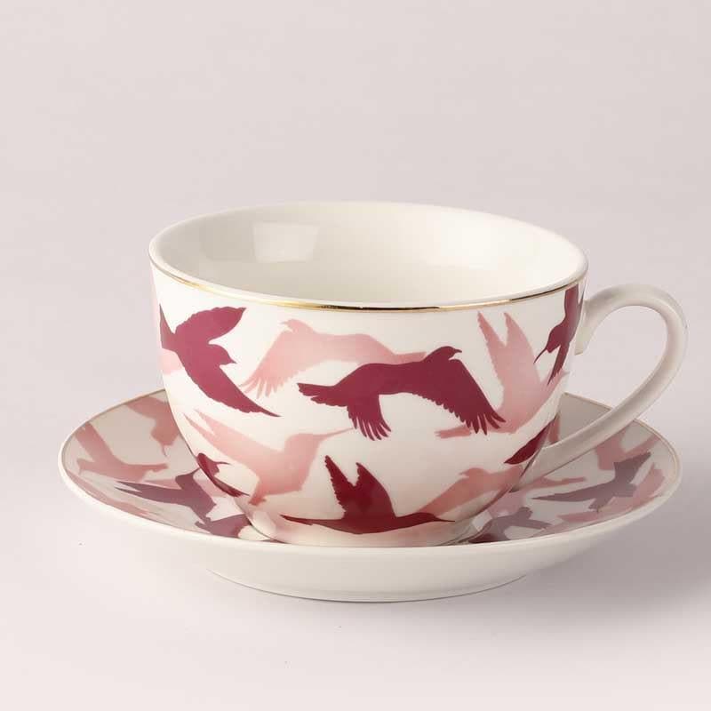 Buy Birds Across Tea Cup & Saucer - Set Of Two Tea Cup & Saucer from Vaaree