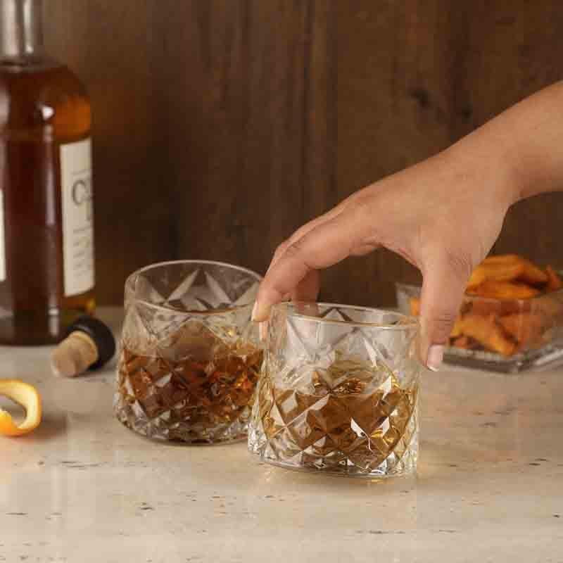 Buy Crossed Spinning Whiskey Glass (300 ml ) - Set Of Two Scotch & Whiskey Glasses from Vaaree